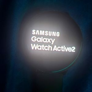 Samsung Active2 smart watch 44m black needs a new band over and minor chips